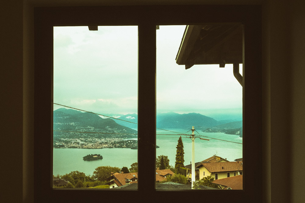 view of lake and houses from a window