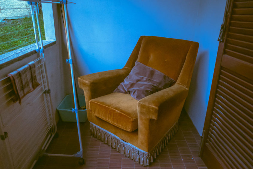 balcony with brown armchair