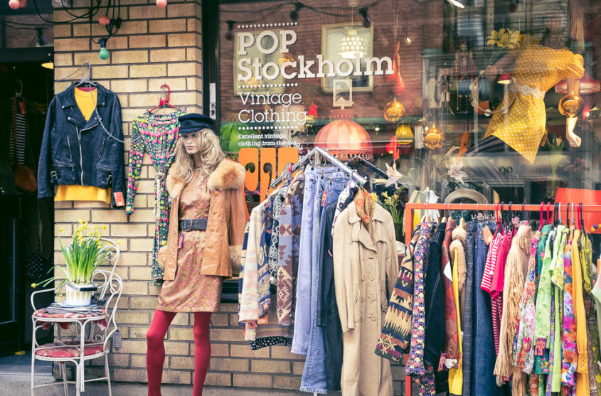 clothes and mannequin outside a vintage shop